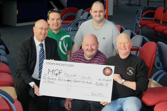 Steam Packet’s Brian Convery, Ales Neuwirt, Chris Brown, Paul Turton and Bob Taylor of the MGP Supporters Club